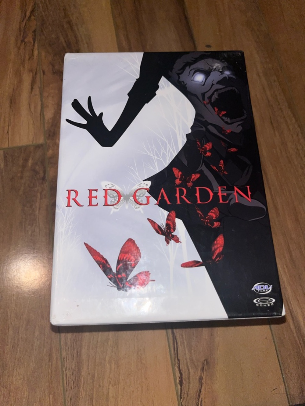 Red Garden DVD Case with Red Butterfly Artwork